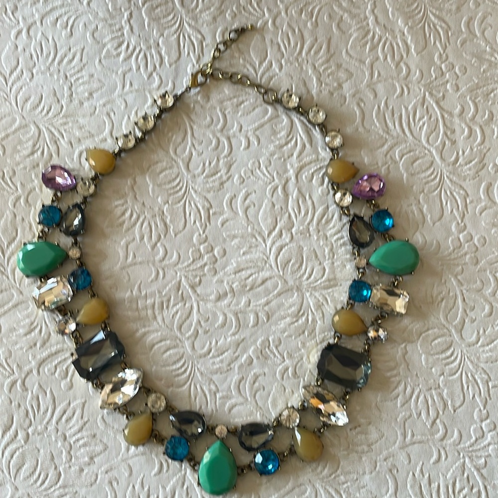 Multi coloured stone necklaces on brass coloured links